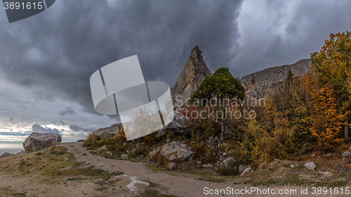 Image of mountain cliff on a cloudy autumn day