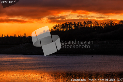 Image of red sunset over water