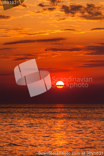 Image of red sunset over water