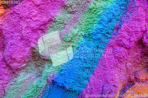 Image of flagstone painted with bright colors.