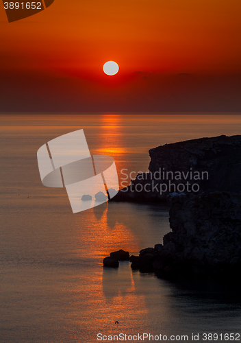 Image of red sunset over water