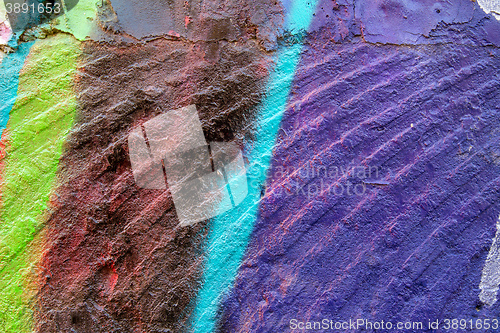 Image of flagstone painted with bright colors.