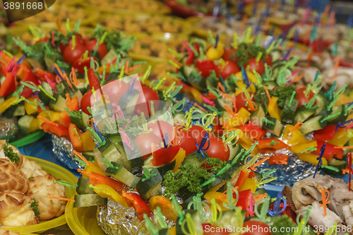 Image of canapes of tomato, cucumber and sweet pepper