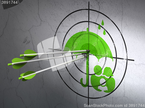 Image of Safety concept: arrows in Family And Umbrella target on wall background