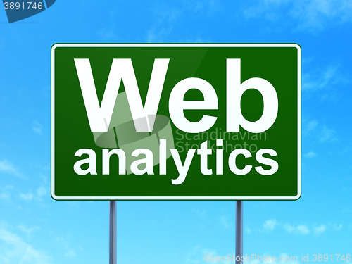 Image of Web development concept: Web Analytics on road sign background