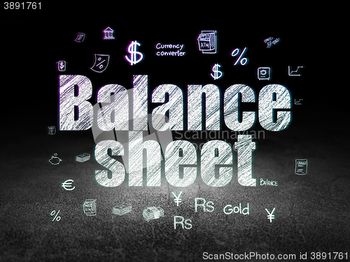 Image of Currency concept: Balance Sheet in grunge dark room