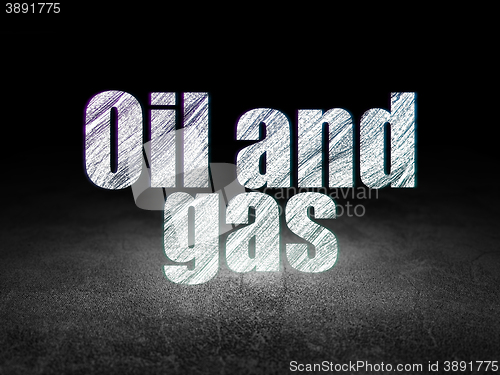 Image of Industry concept: Oil and Gas in grunge dark room