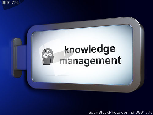 Image of Studying concept: Knowledge Management and Head With Gears on billboard background