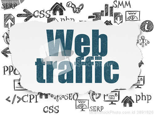 Image of Web development concept: Web Traffic on Torn Paper background