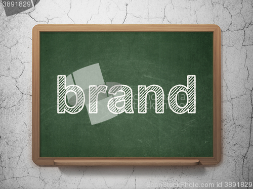 Image of Marketing concept: Brand on chalkboard background