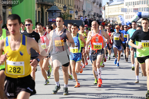 Image of NOVI SAD, SERBIA - APRIL 03: Starting runners, participants in t