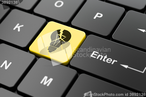 Image of Business concept: Light Bulb on computer keyboard background