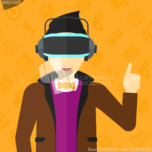 Image of Man wearing virtual reality headset.