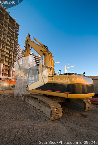 Image of excavator at the construction place