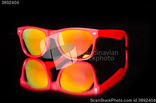 Image of colored sunglasses.