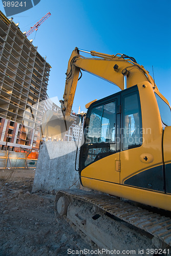 Image of excavator at the construction place