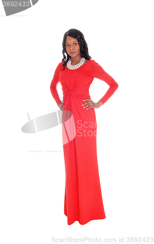 Image of Slim African American woman long red dress.