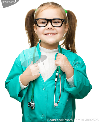 Image of Cute little girl is playing doctor