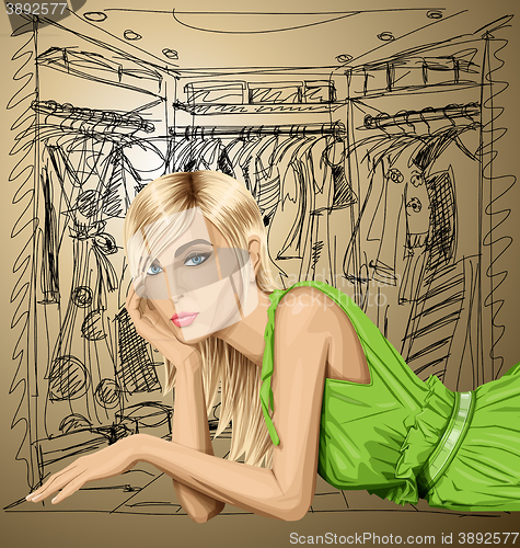 Image of Blonde in pink lies on a floor