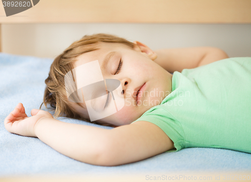 Image of Cute little boy is sleeping