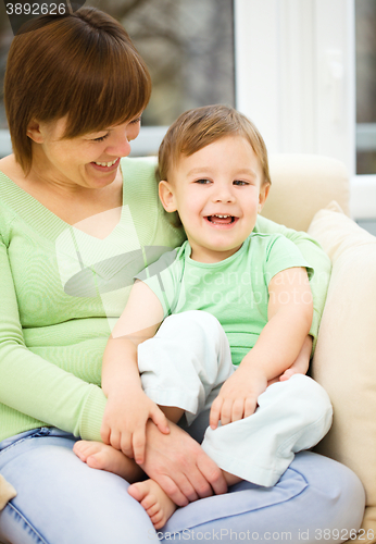 Image of Mother is having fun with her son