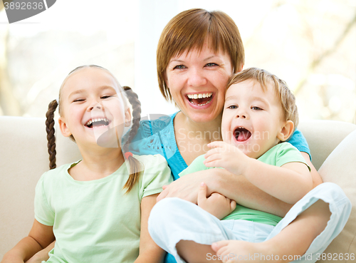 Image of Mother is having fun with her son