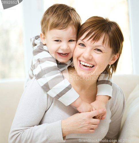 Image of Mother holding her son