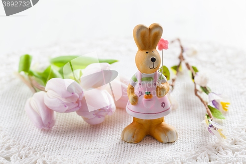 Image of Easter bunny with painted eggs