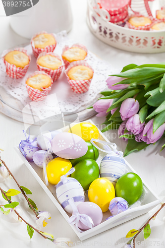 Image of Easter place setting with painted eggs