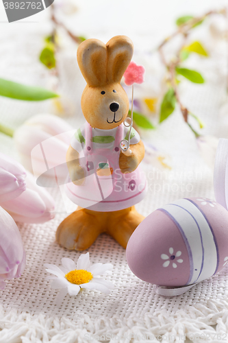 Image of Easter bunny with painted eggs