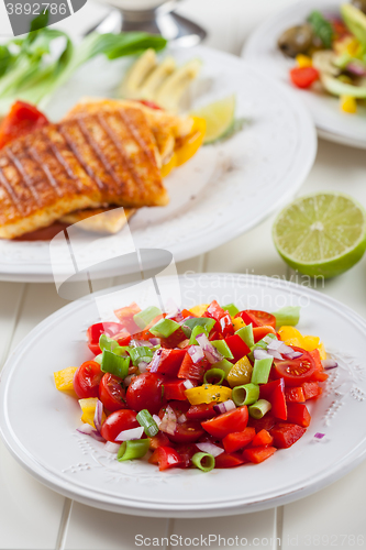 Image of Salsa salad with grilled cheese