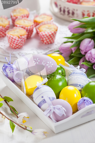 Image of Easter place setting with painted eggs