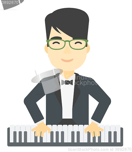 Image of Man playing piano.