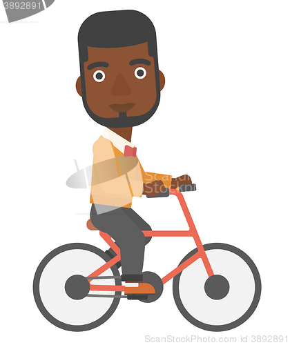 Image of Man cycling to work.