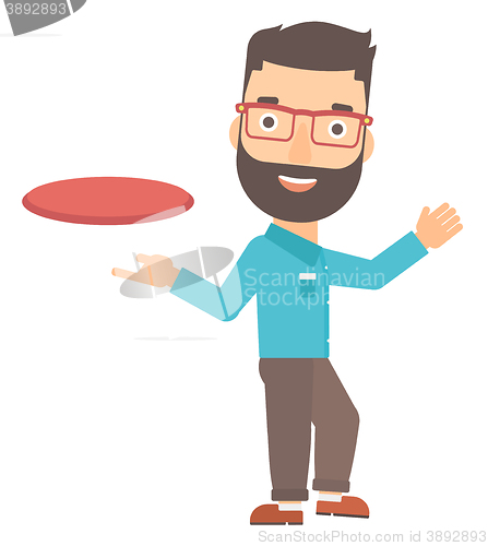 Image of Man playing flying disc.