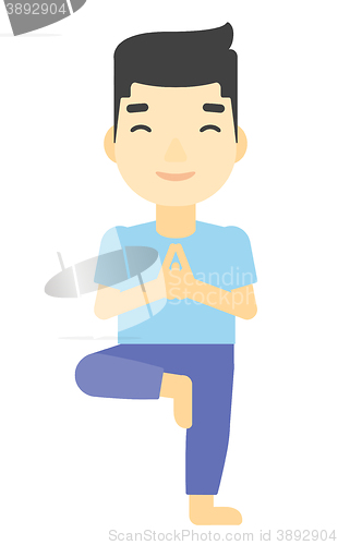 Image of Man practicing yoga.