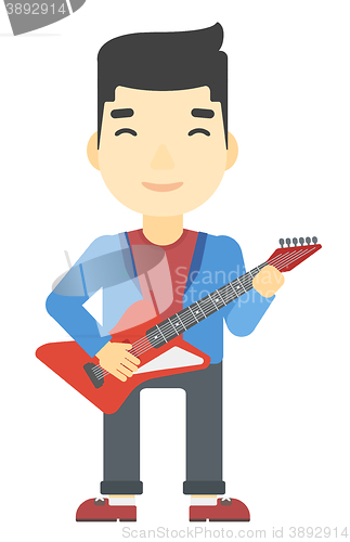 Image of Musician playing electric guitar.