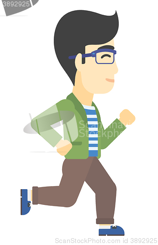 Image of Smiling businessman running.