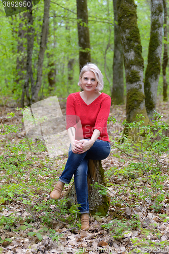 Image of Blonde in a red pullover