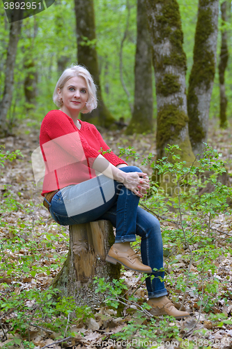 Image of Blonde in a red pullover