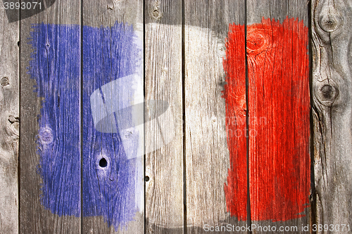 Image of france colors on old wooden wound