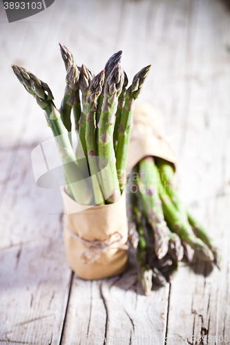 Image of two bunches of fresh asparagus