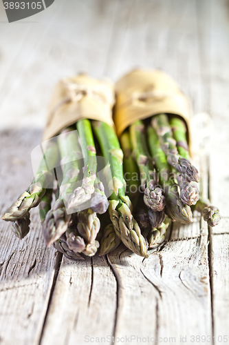 Image of two bunches of fresh asparagus 