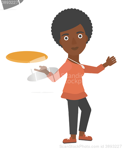 Image of Woman playing flying disc.