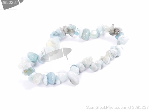 Image of Splintered aquamarine chain on white background