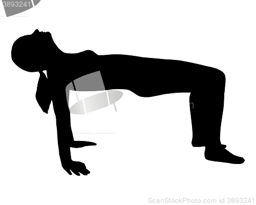 Image of Silhouette of woman doing yoga