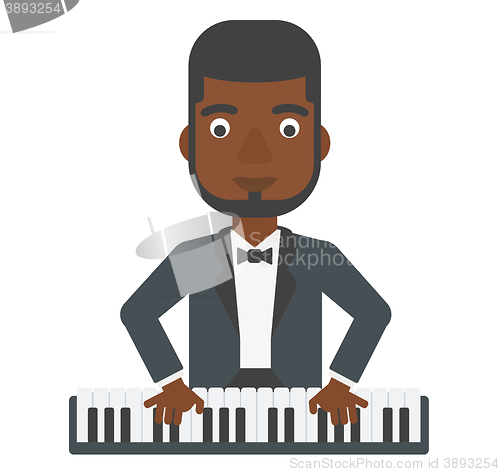 Image of Man playing piano.