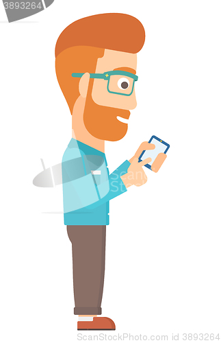 Image of Man using mobile phone