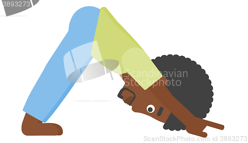 Image of Man practicing yoga.