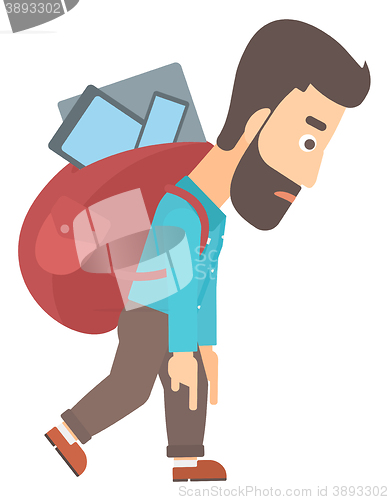 Image of Man with backpack full of devices.